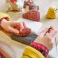two hands needle felting