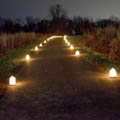 luminaries along paved path at Bill Yeck Park