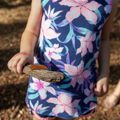 child holding stick with a caterpillar on it