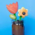 chocolate pudding cup with flowers made of fruit