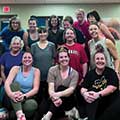 a group of women in exercised clothes