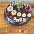 a circular terrarium centered around the theme of "i am groot"