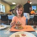 a young girl sculpting clay
