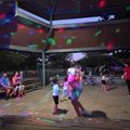 people enjoying a glow in the dark event with glowsticks