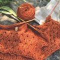 knitting project using orange yarn