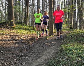three trail runners at Bill Yeck Park