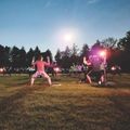 People participating in evening yoga outside